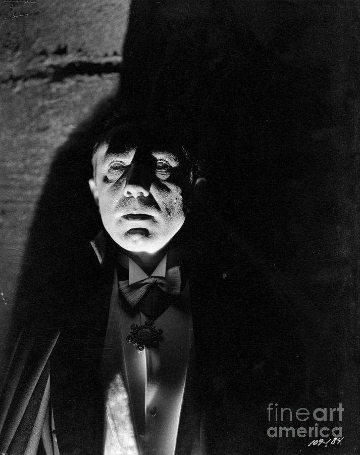 Bela Lugosi Dracula hovers in the shadows Photograph by Vintage Collectables