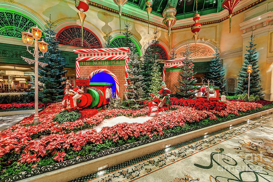 Las Vegas Photograph - Bellagio Christmas Train Decorations Angled Panorama 2017 by Aloha Art