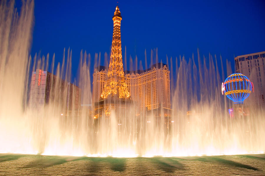 Bellagio Fountains in Front of the Paris Casino on the Las Vegas Strip Photograph by Douglas Pulsipher