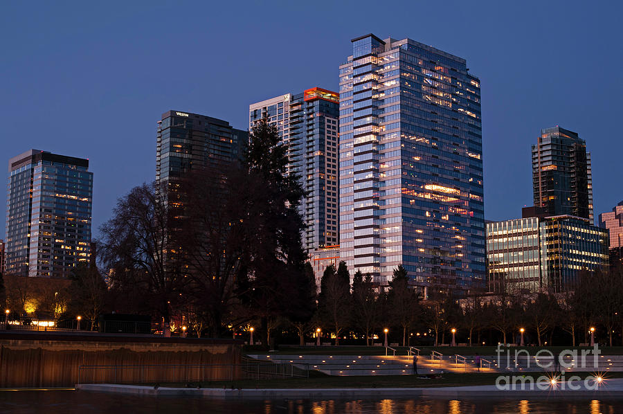 Bellevue Skyline with City Lghts  Photograph by Jim Corwin