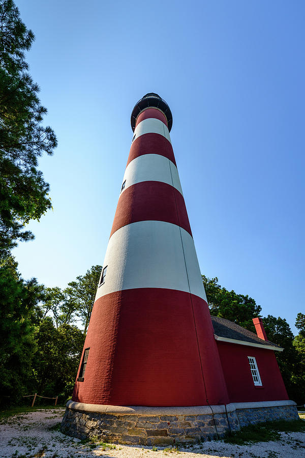 Below the Lighthouse Photograph by Michael Scott