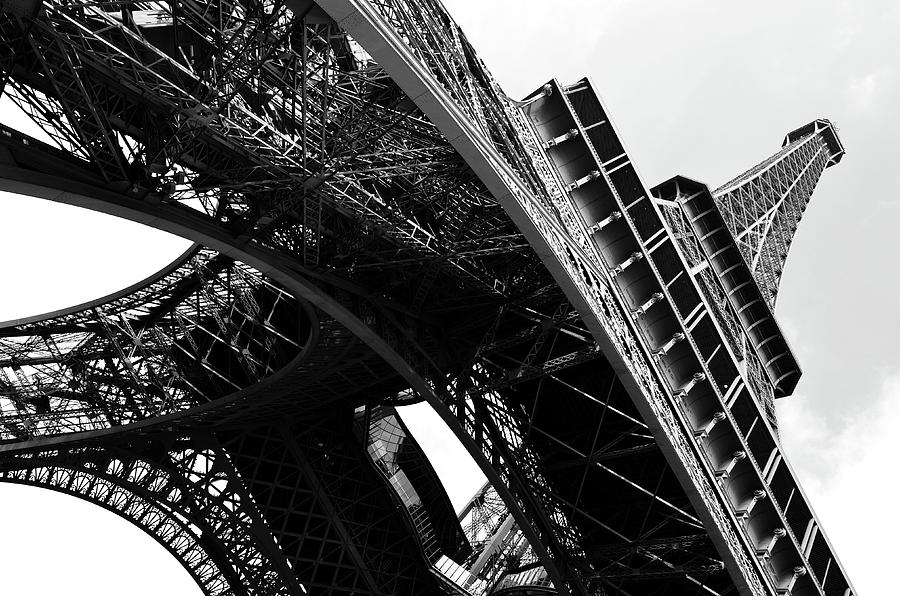 Beneath the Iconic Eiffel Tower Paris France Black and White Photograph by Shawn OBrien