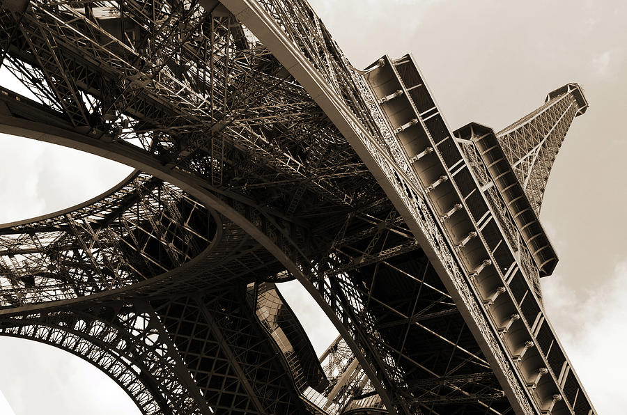 Beneath the Iconic Eiffel Tower Paris France Sepia Photograph by Shawn OBrien