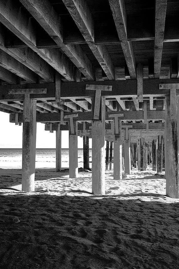 Beneath the Pier BW Photograph by Gary Brandes