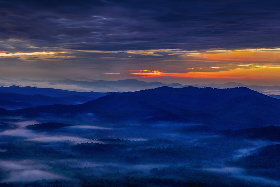 Between Clouds Photograph by Andrew Soundarajan