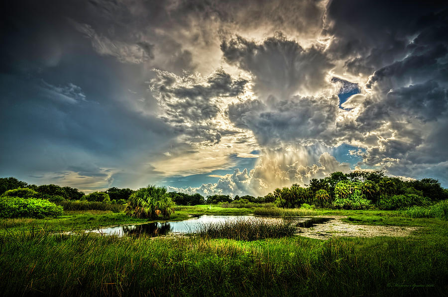 Between Storms Photograph by Marvin Spates