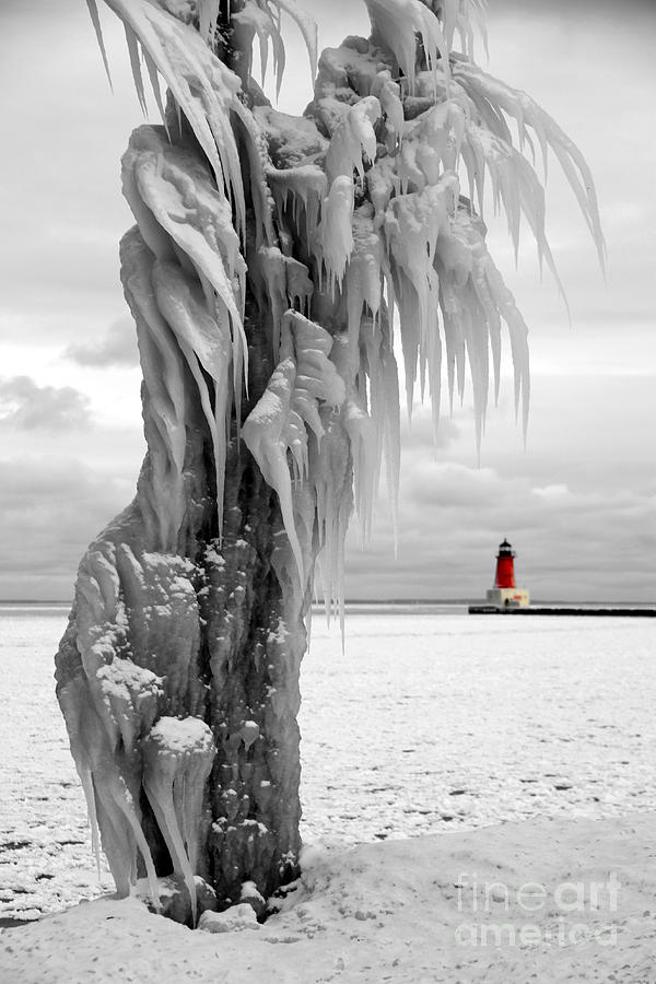 Beyond the Ice Reapers Grasp -  Menominee North Pier Lighthouse Photograph by Mark J Seefeldt