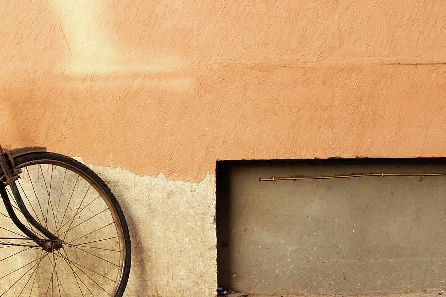 Bicycle Textured Orange wall and The Rectangle Photograph by Prakash Ghai
