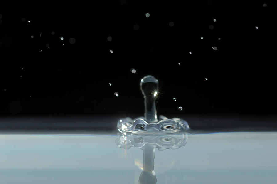 Big drop of water making a splash Photograph by Dan Friend
