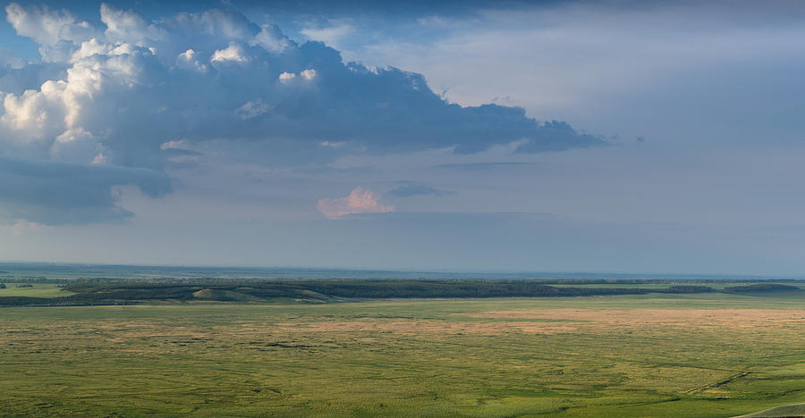 Big Rain Clouds Gather Over a Steppe Photograph by John Williams