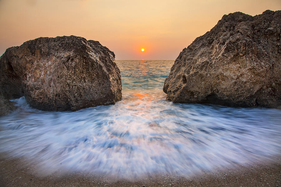 Big rocks and wave with sunset on paradise island Greece Photograph by ...