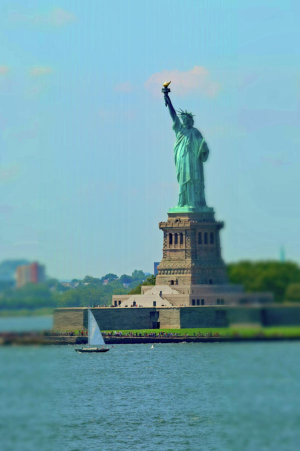 Big Statue, Little Boat Photograph by Sandy Taylor