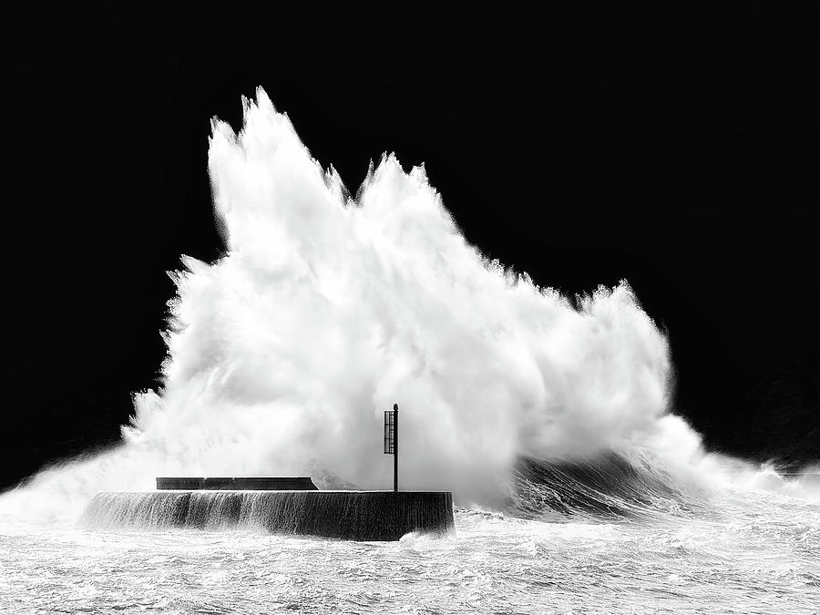 Big Wave Breaking On Breakwater Photograph by Mikel Martinez de Osaba