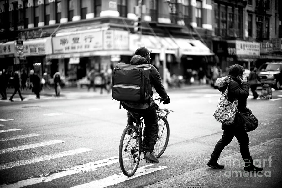Chinatown Biking in New York City Photograph by John Rizzuto