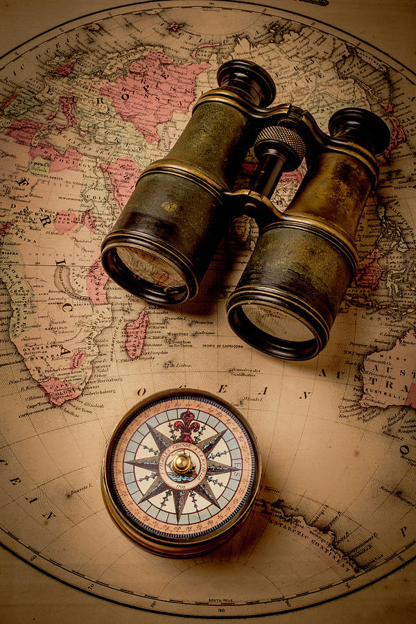 Binoculars And Compass On Map Photograph by Garry Gay