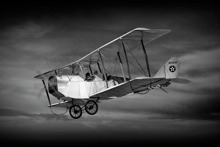 Biplane with Cloudy Sky in Black and White Photograph by Randall Nyhof