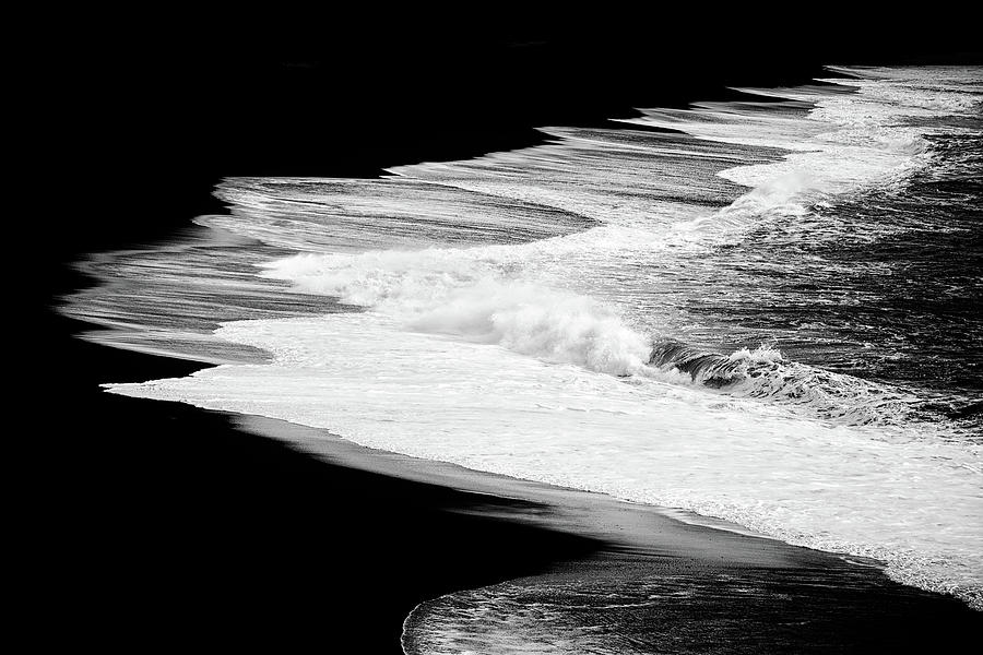 Black beach and the water of the ocean Photograph by Matthias Hauser