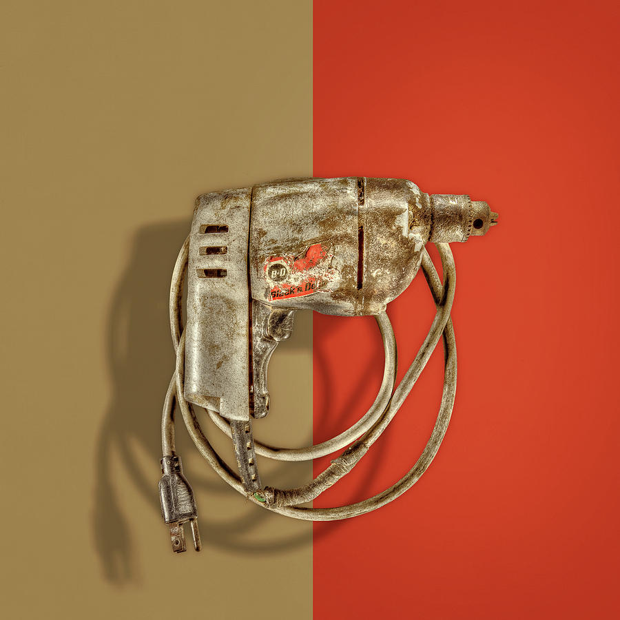 Black Decker Drill Motor on Color Paper Photograph by YoPedro