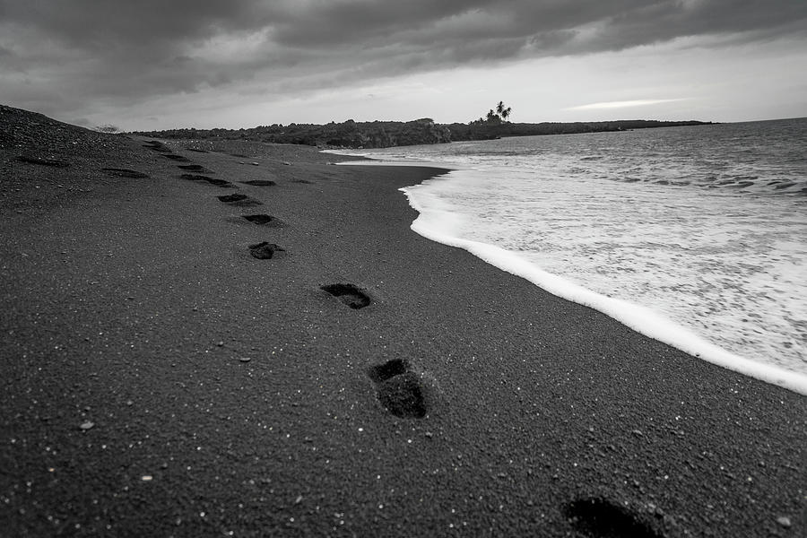 Black And White Photograph - Black Sand Footprints by Sean Davey