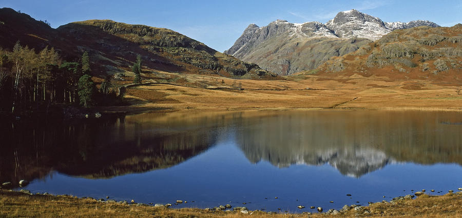 Mountain Photograph - Blea Tarn and the Langdale Pikes by John Perriment