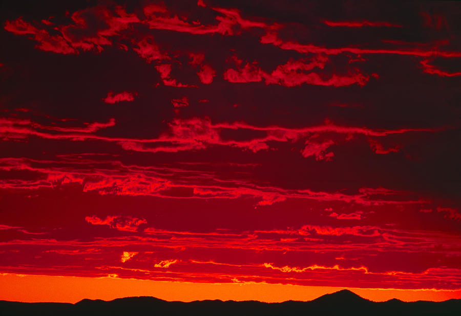 Blood Red Sunset Photograph by Bob Neiman