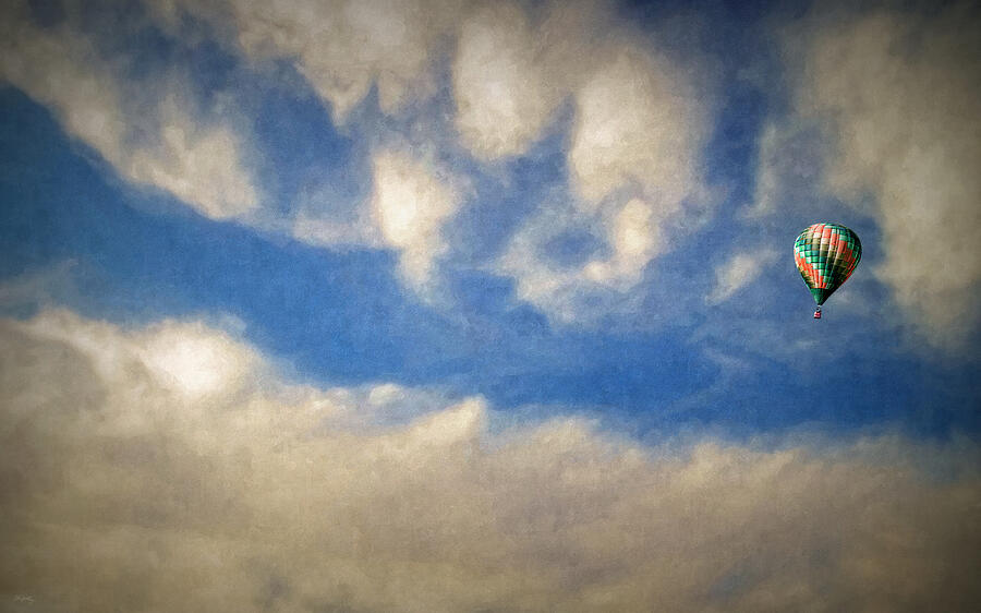 Blown Into A Soft Sky Photograph by Glenn McCarthy Art and Photography