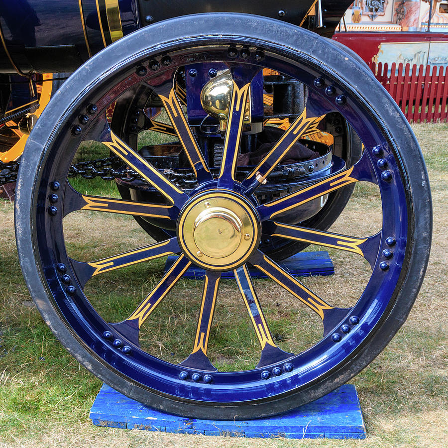 Blue and brass traction engine wheel Photograph by Chris Warham Fine Art America