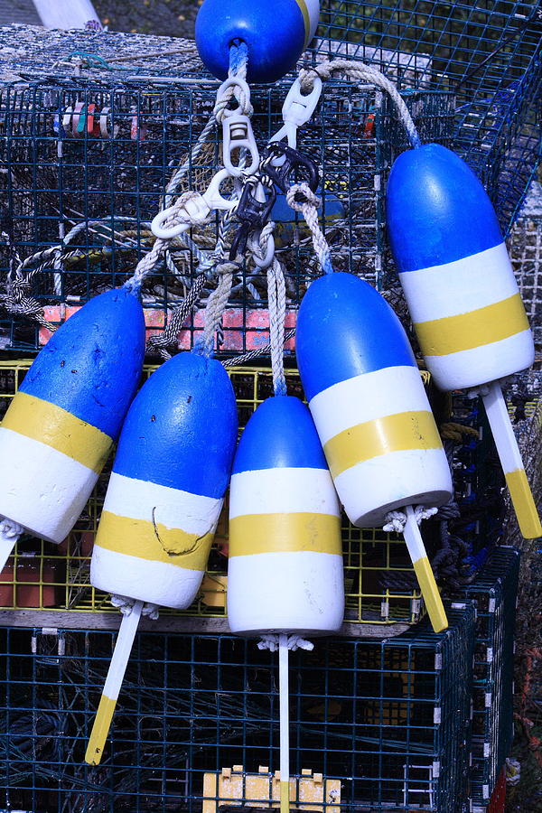 Blue And Gold Bouys Photograph by Doug Mills