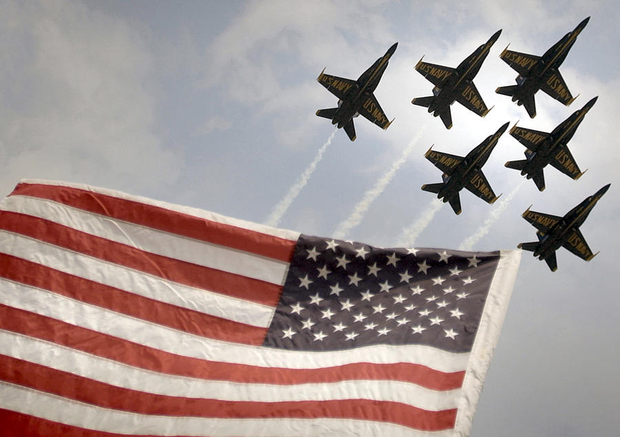 Flag Photograph - Blue Angels soars over Old Glory as they perform the Delta Formation by Celestial Images