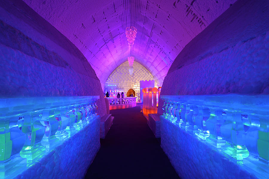 Blue bedrooms with red Chapel and ice bar at the Aurora Ice Muse Photograph by Reimar Gaertner
