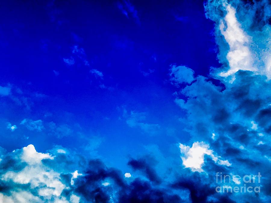 Blue Clouds Photograph by Michael Krek