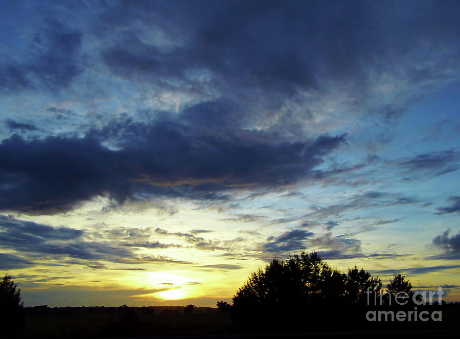 Blue Clouds Silhouette Sunrise Photograph by D Hackett
