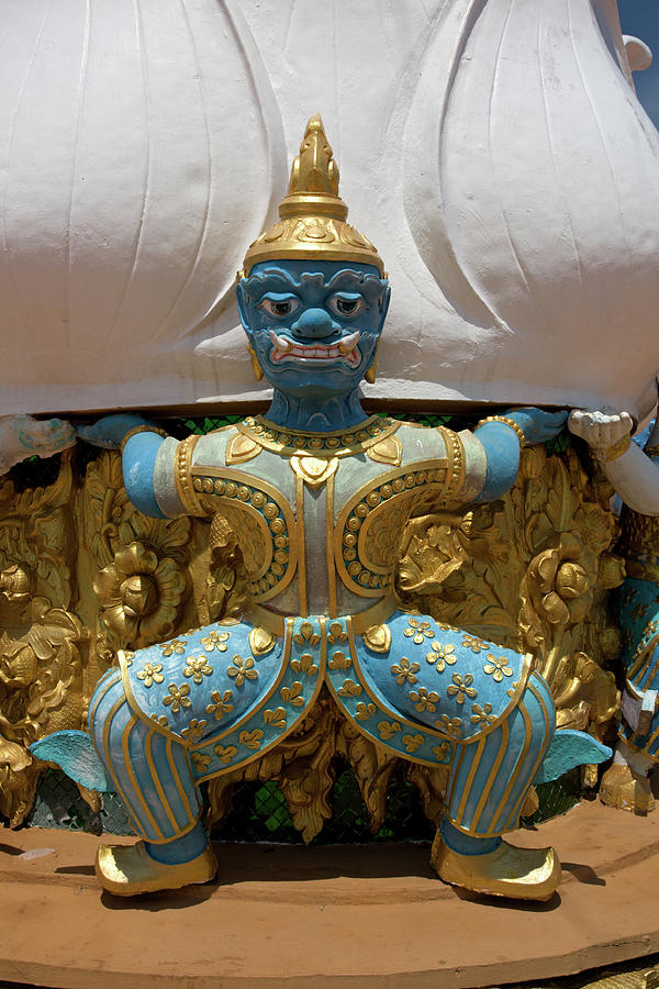 Blue Faced Man on Golden Buddha Statue, Tiger Cave Temple Photograph by Aivar Mikko