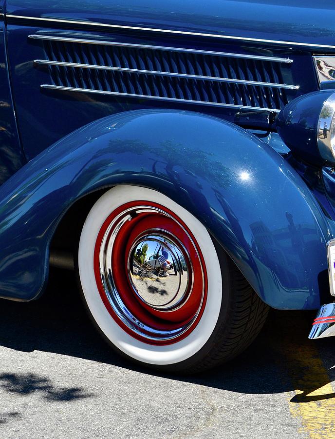Blue Ford Fender with Red Wheel Photograph by Dean Ferreira