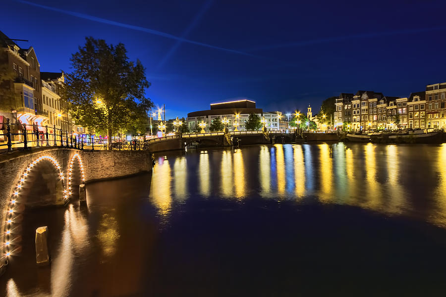 Blue hour in Amsterdam Photograph by Nadia Sanowar