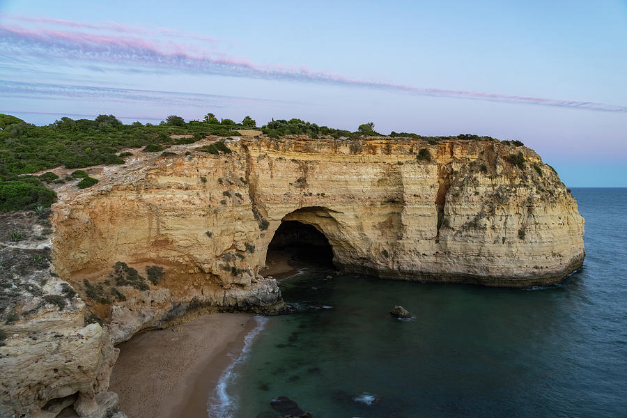 Blue Hour with a Hint of Pink at Vale Covo Sea Cave in Algarve Portugal Photograph by Georgia Mizuleva