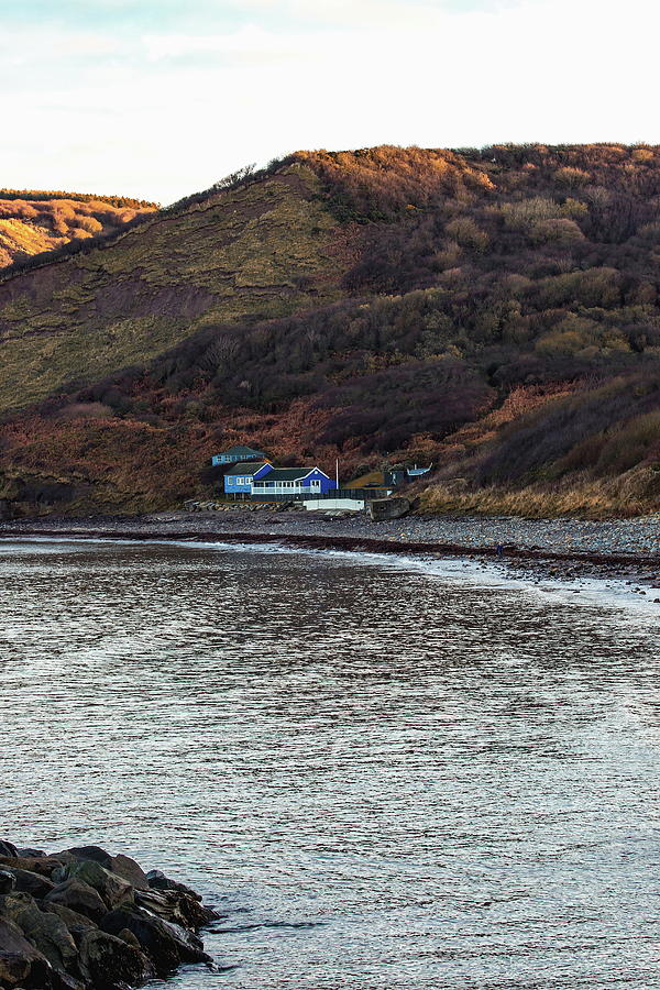 Blue Huts at the Bottom of the Cliff Photograph by Jeff Townsend