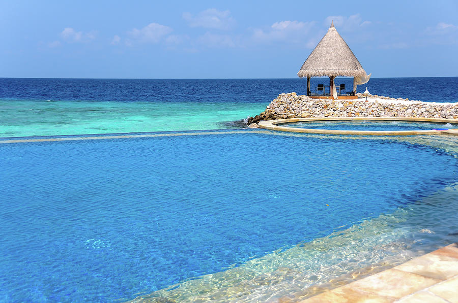 Blue Infinity Pool. Maldives Photograph by Jenny Rainbow