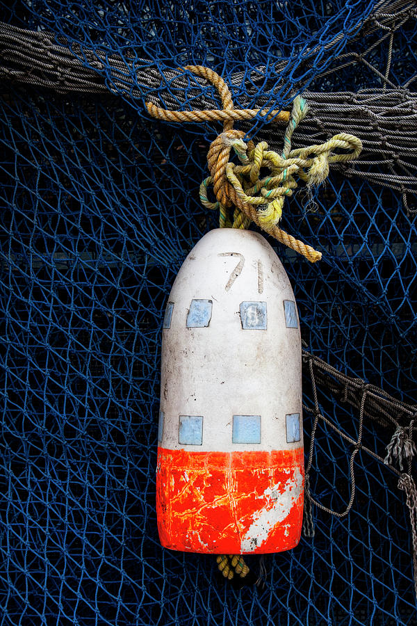 Blue Net and Orange and White Buoy Photograph by Carol Leigh