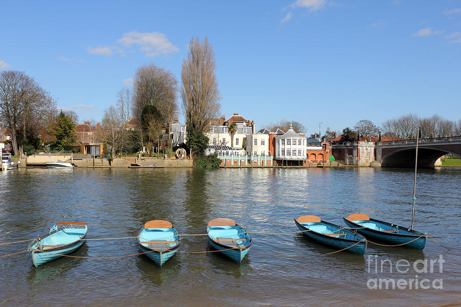 Blue rowing boats on the Thames at Hampton Court London Photograph by Julia Gavin