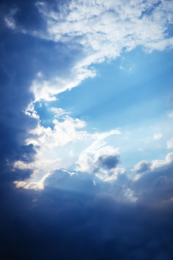 Nature Photograph - Blue sky and clouds with sun light by Jozef Klopacka