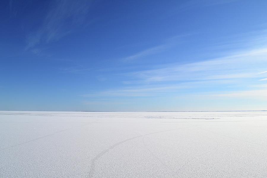 Blue Sky Over Frozen Lake Simcoe  Photograph by Lyle Crump