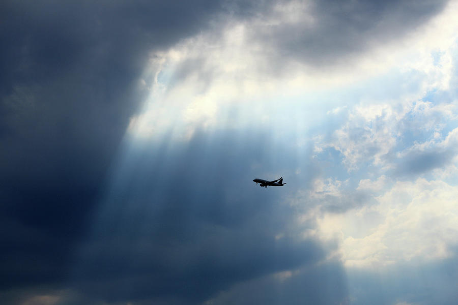 An Airplane In Blue Photograph by Cora Wandel