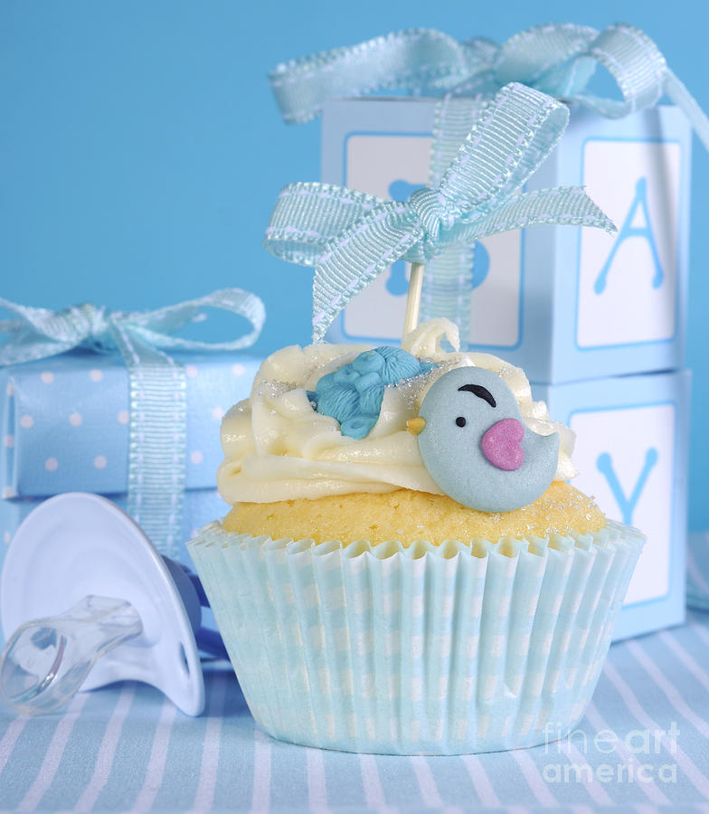 Blue theme baby boy cupcake Photograph by Milleflore Images