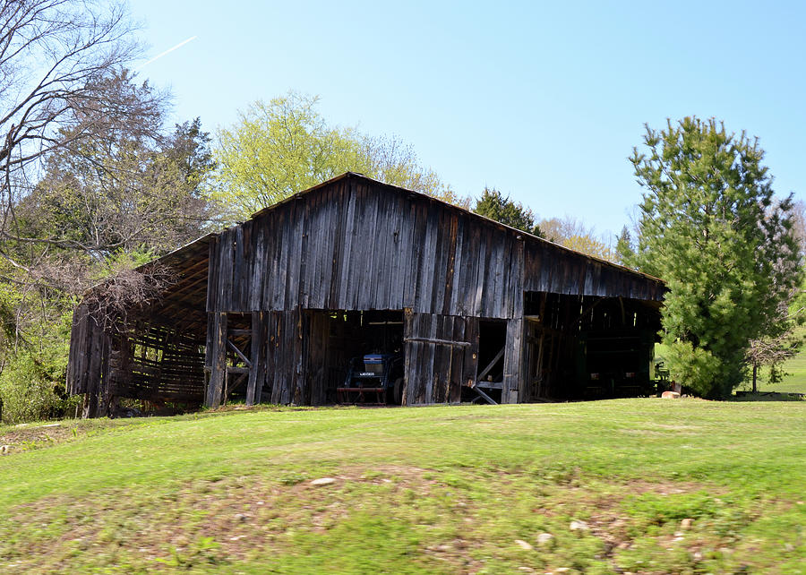 Blue Tractor in Broken Down Barn Photograph by Jennifer Kocan - Fine ...