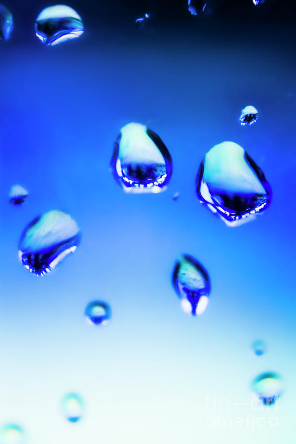 Blue water droplets on glass Photograph by Jorgo Photography