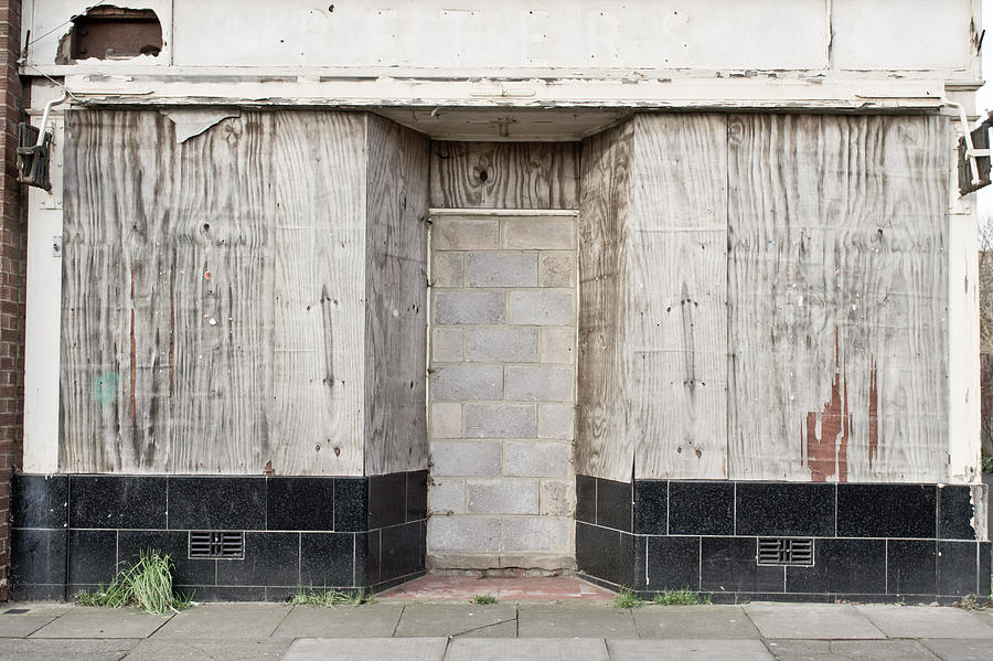Architecture Photograph - Boarded up shop by Tom Gowanlock