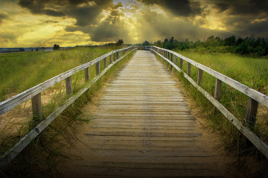 Boardwalk on the Beach with Radiant Sunbeams Photograph by Randall Nyhof