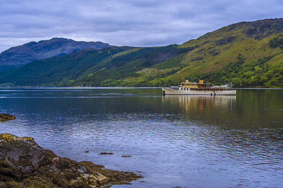 Boat Anchored On Loch Duich Photograph by Steven Ainsworth