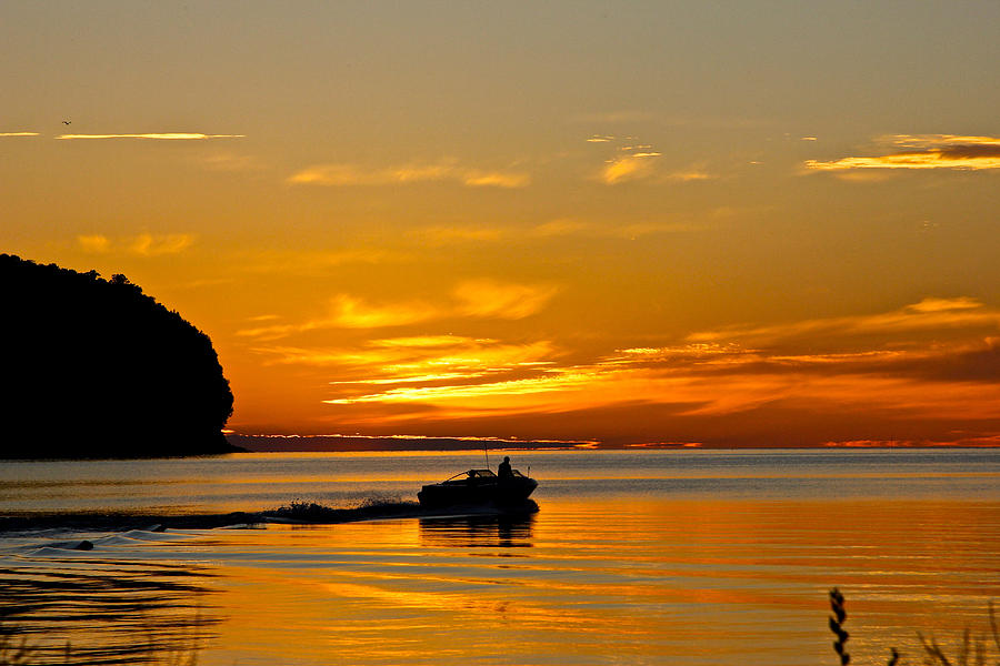Boat and Bluff at Sunset by Jon Reddin Boat and Bluff at Sunset by Jon Reddin